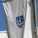 Flags in front of sports hall in Trstenik